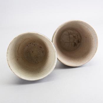 A set of two 19th century Persian earthenware pots.