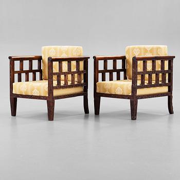 87. A pair of Chinese armchairs, 1920's.