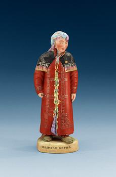 A Russian bisquit figure of a Khanty woman, Gardner (Dimitrovsk Porcelain Manufactory 1929-34),