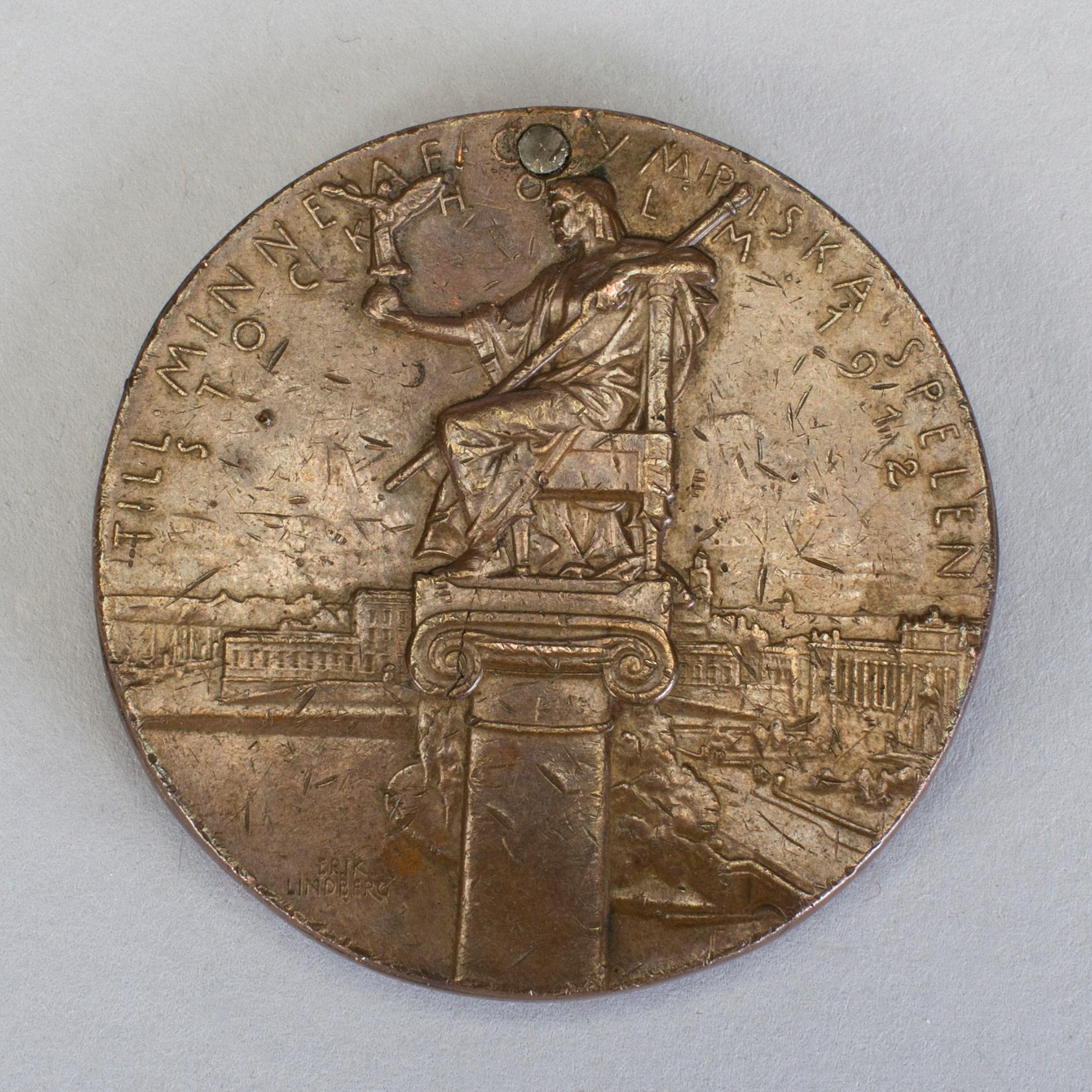 A bronze participant medal from the 1912 olympic games in Stockholm.