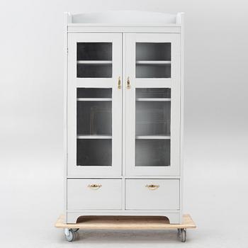 Display cabinet, early 20th century.