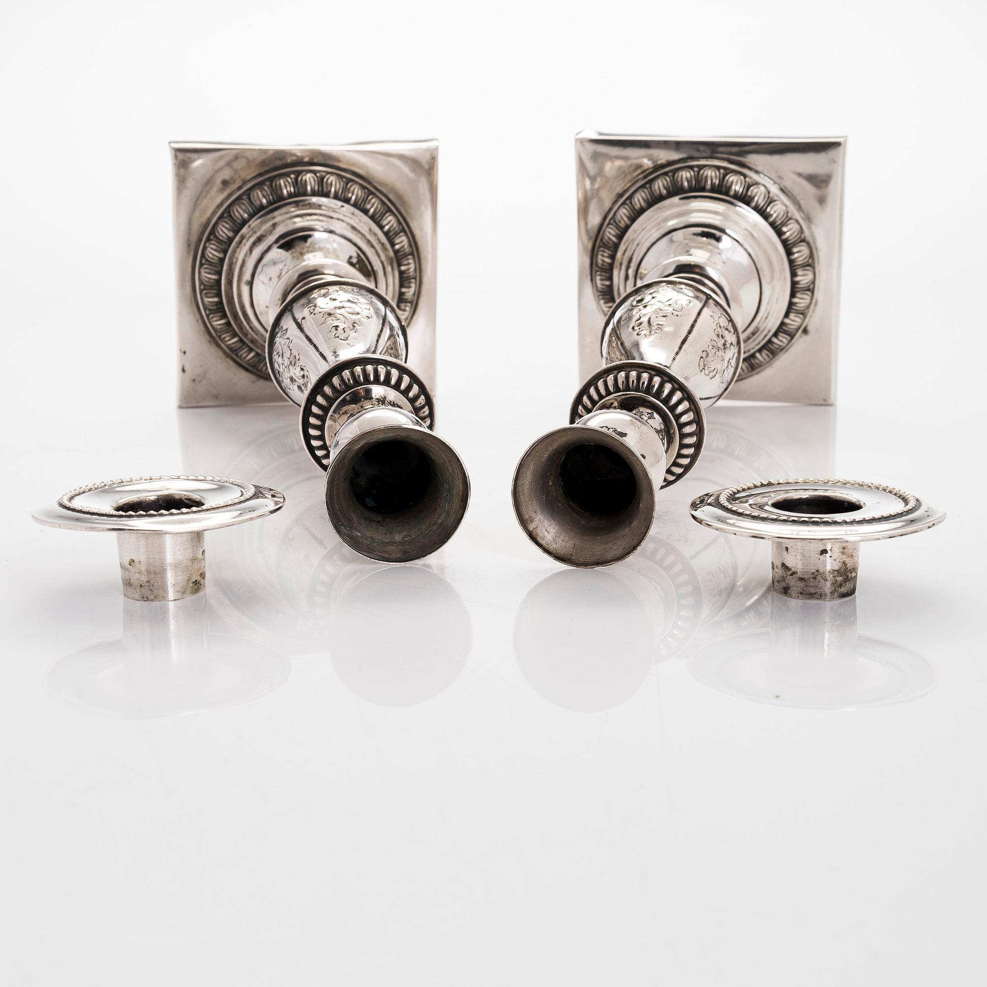 A pair of Sabbath candlesticks in low-grade silver, Poland. Unidentified makers mark.