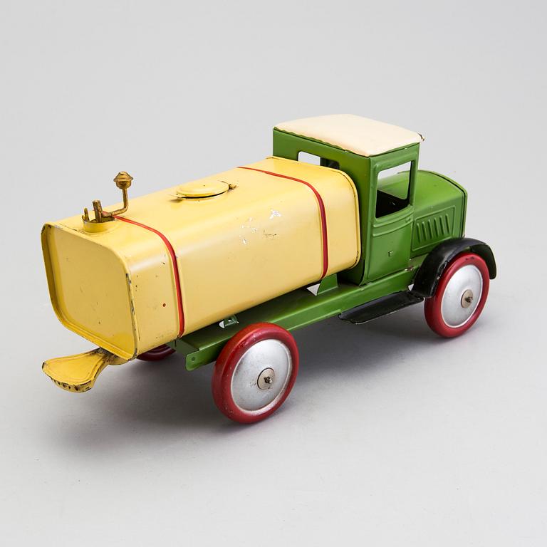 A water spraying truck, Germany, ca 1950.