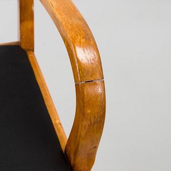 A 1920s/30s century dining table and set of 6 + 2 chairs.