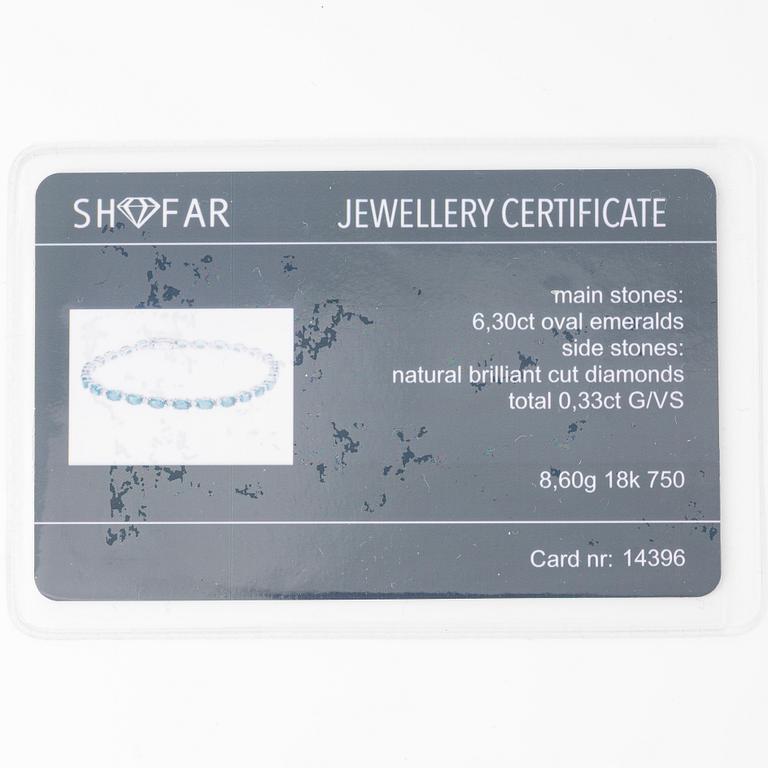 Bracelet 18K white gold with emeralds and brilliant-cut diamonds.