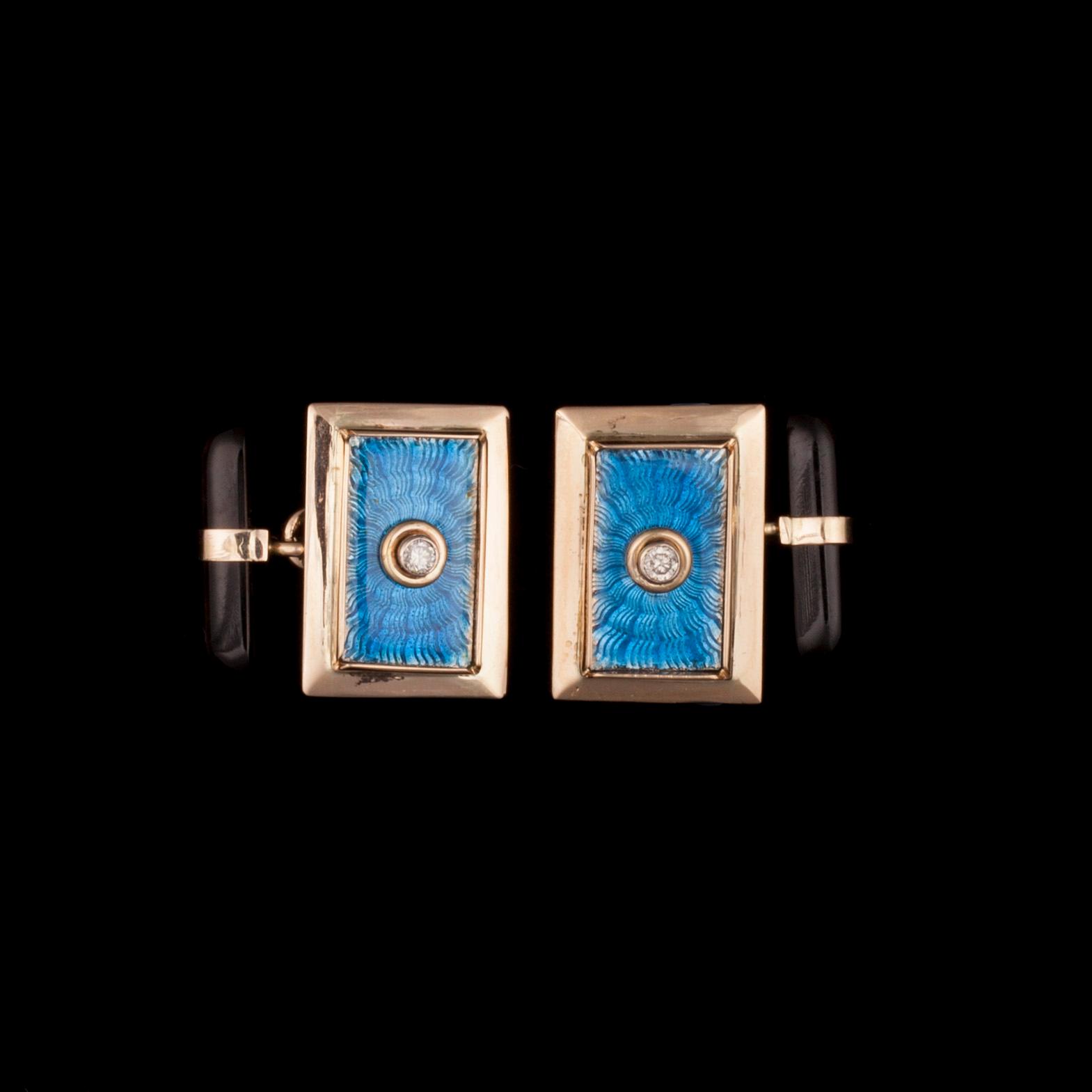 MANSCHETTKNAPPAR, 14K guld, emaljerade, med diamanter 2 x 0,02 ct. Vikt 8,7 g.