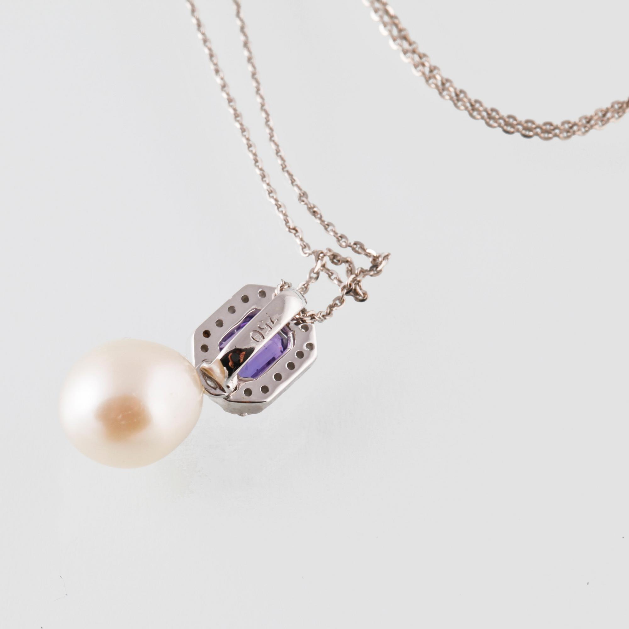 HÄNGE, 18K vitguld med odlad pärla, lila safir ca 0.82 ct samt briljantslipade diamanter ca 0.15 ct Vikt 3,8 gram.