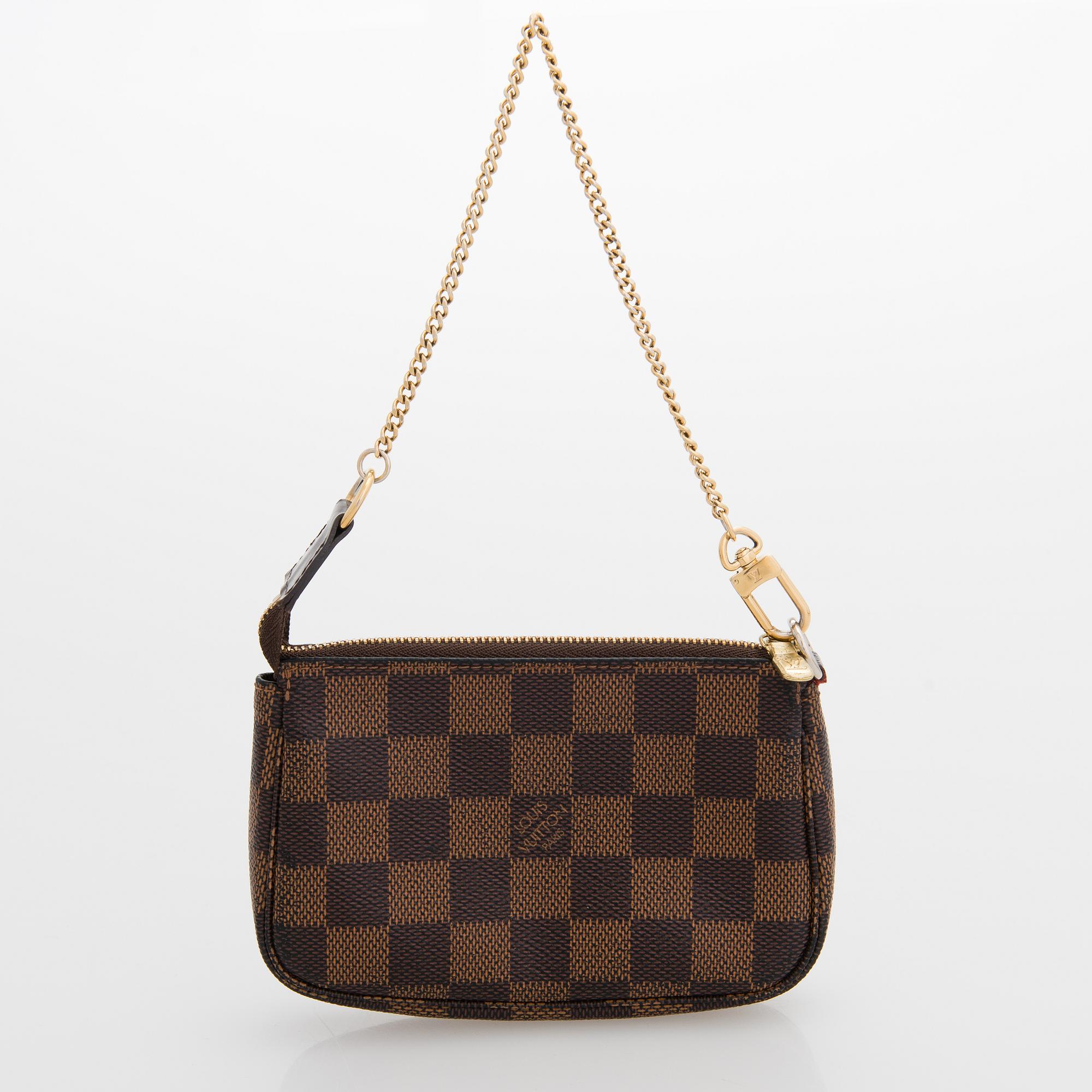 Louis Vuitton, "Neverfull GM" laukku samt pochette.