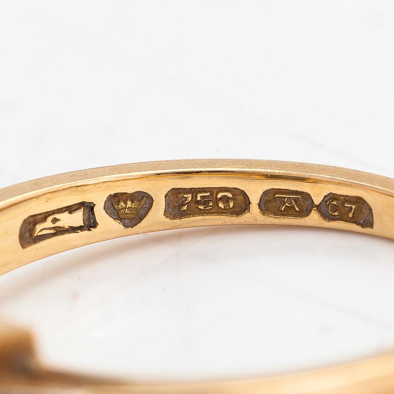 Ring, 18K guld, diamanter tot ca. 0.06 ct samt smaragd. Auran Kultaseppä Oy, Turku 1956.