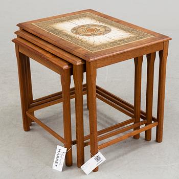 A nest of three 1960/70s tables.