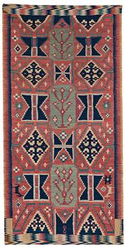 A CARRIAGE CUSHION, "Träd och timglas", double interlocked tapestry, ca 101,5 x 50,5 cm, Scania, Sweden,