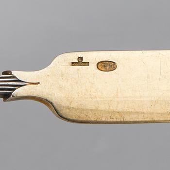 A set of Fabergé parcel-gilt silver dessert cutlery, 11 pieces + one fork later manufactured by Kultakeskus, Finland.