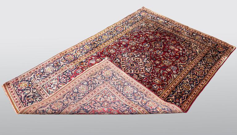 A carpet, Old silk, Kashan, ca 200 x 128 cm.