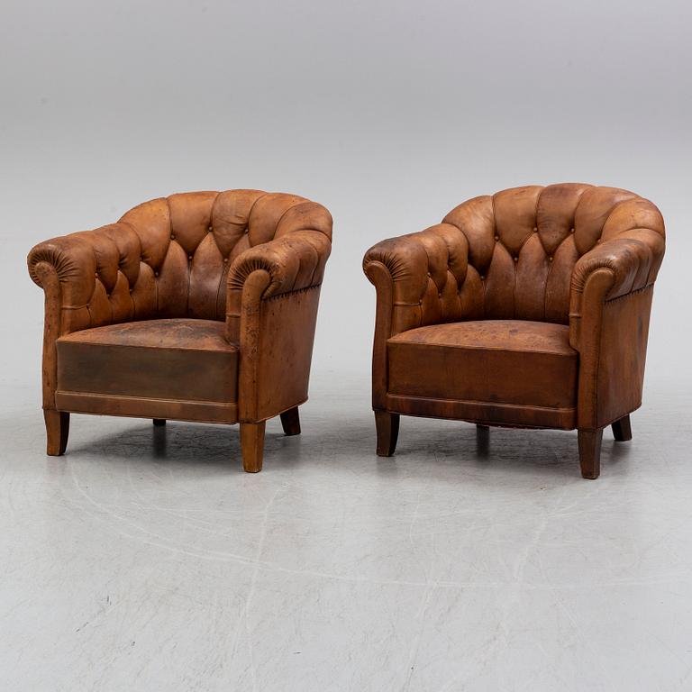 A pair of armchairs from the first half of the 20th century.