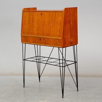 A Swedish teak veneered 'Bang' secretaire, circa 1960s, from Ikea.