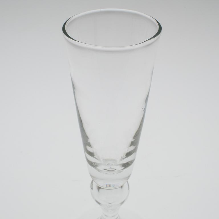 A set of twelve "Antik" wine glasses by Reijmyre Glasbruk.