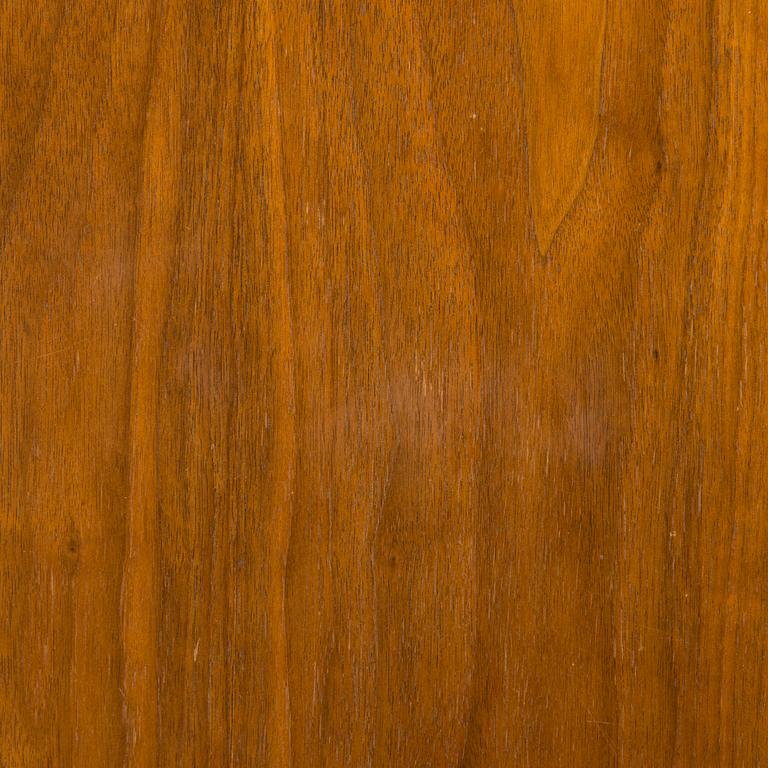 A 1960s teak and oak dining table.