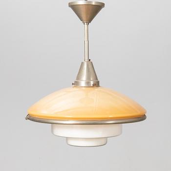 Otto Müller, Taklampa, "Sistrah-pendel", Megaphos, 1900-talets första hälft.