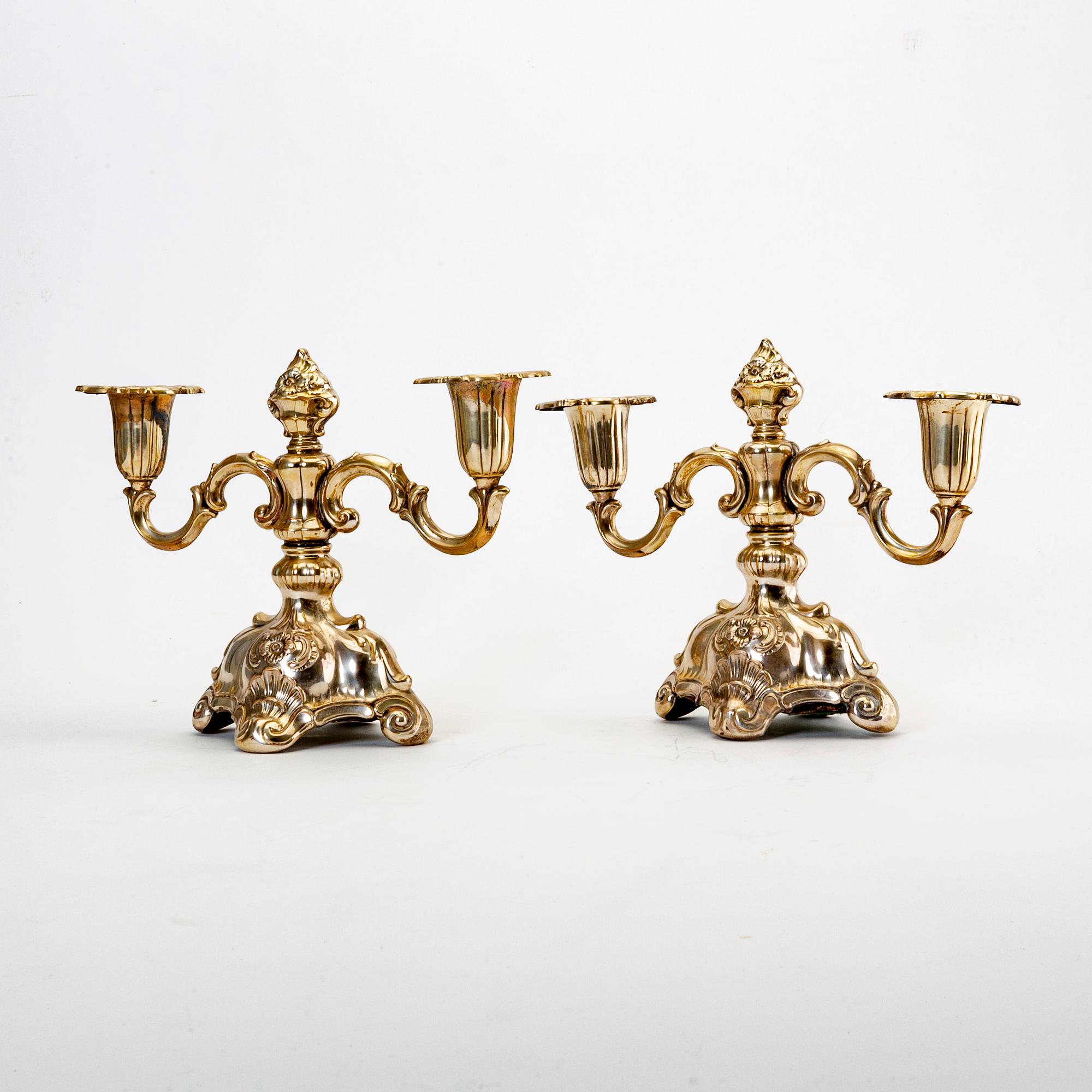 A pair of Swedish 20th century silver candelabras mark of CG Hallberg Stockholm 1939.