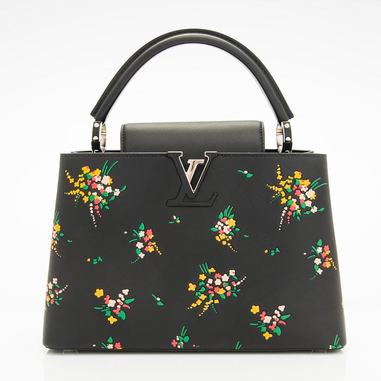 Louis Vuitton, a "Blossom Capucines PM" leather handbag.