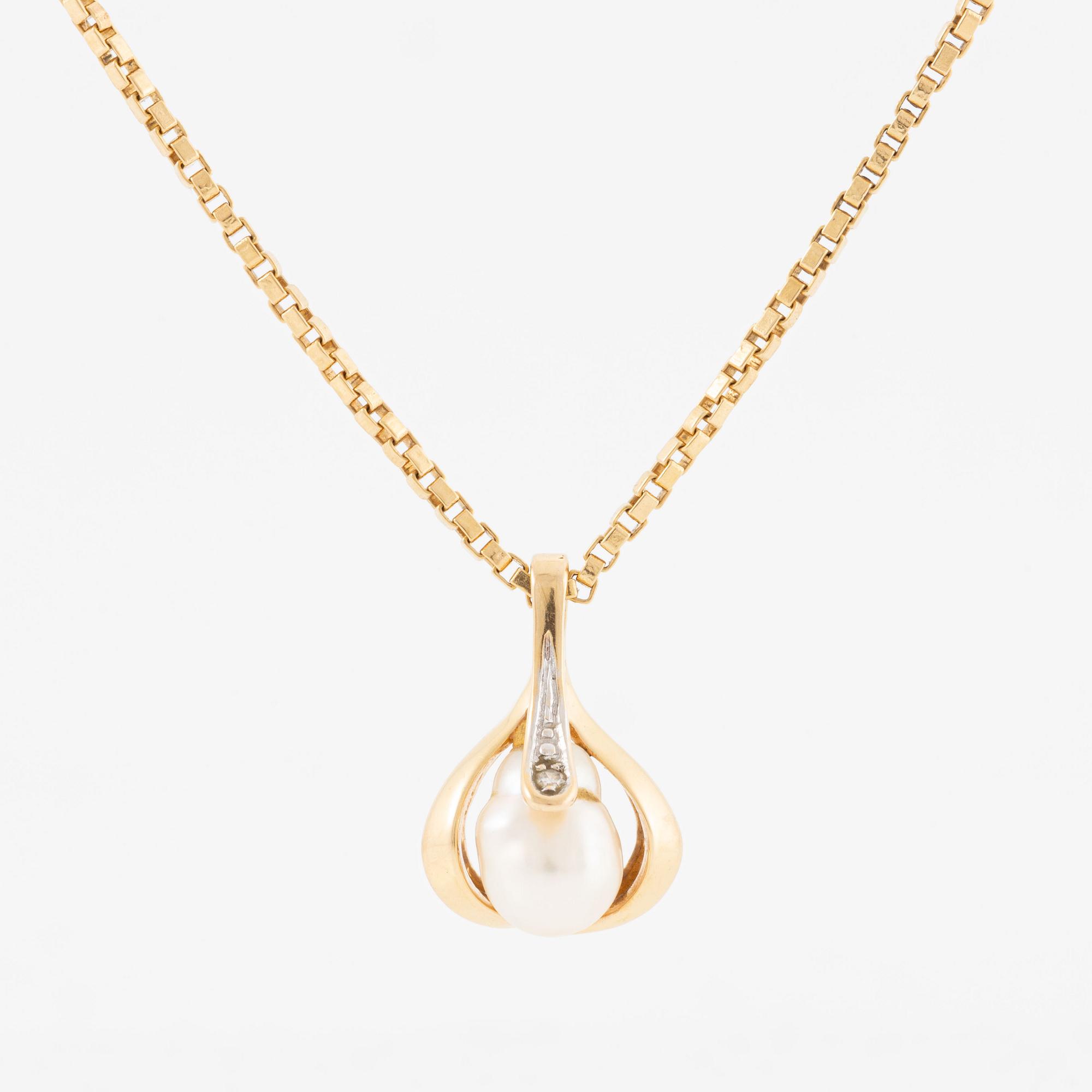 Hänge med kedja 18K guld med en odlad pärla och en diamant.