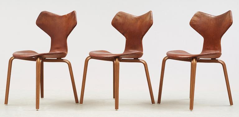 Three Arne Jacobsen teak and brown leather 'Grand Prix' chairs, Fritz Hansen, Denmark 1950's-60's.