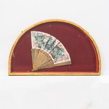 A painted early 1900s Chinese fan.