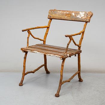 A garden sofa and armchair, Bolinder, Stockholm, circa 1900.