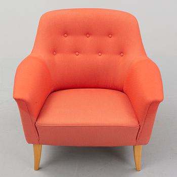 A late 20th century easy chair.