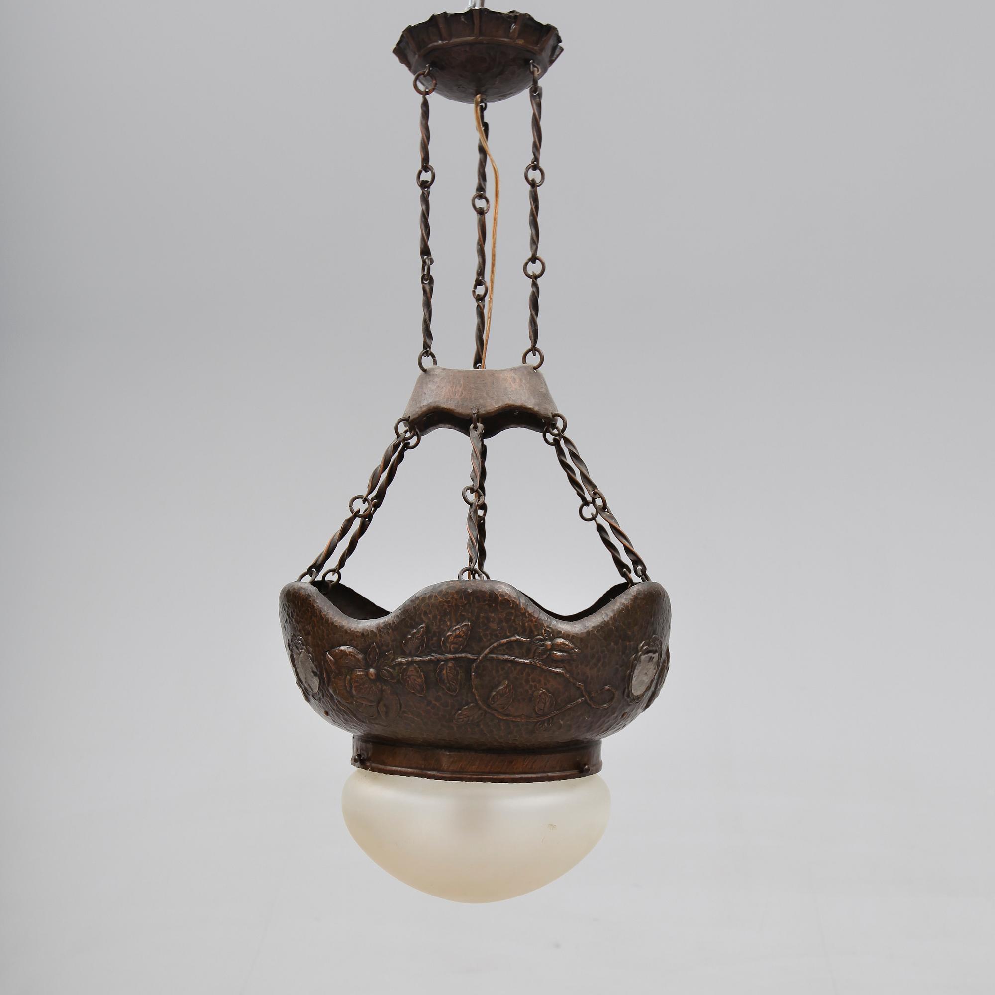 TAKLAMPA, 1900-talets första hälft.