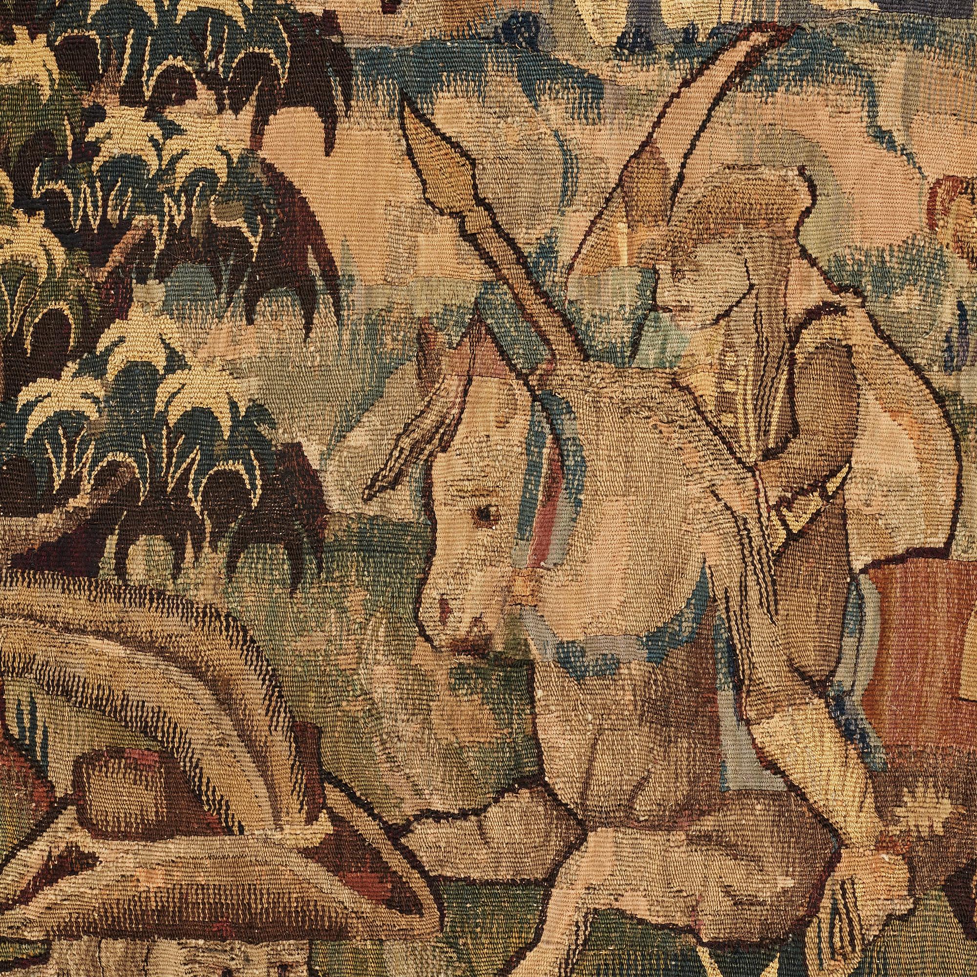 A TAPESTRY, "Lion hunting", tapestry weave, Flanders the middle of the 17th century, possibly Oudenarde, ca 262 x 249 cm.