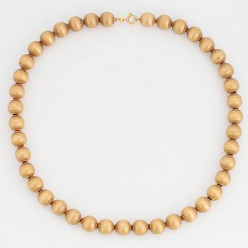 A 18K gold necklace made in Arezzo, Italy.