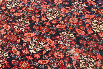 A Farahan carpet, c. 520 x 205 cm.