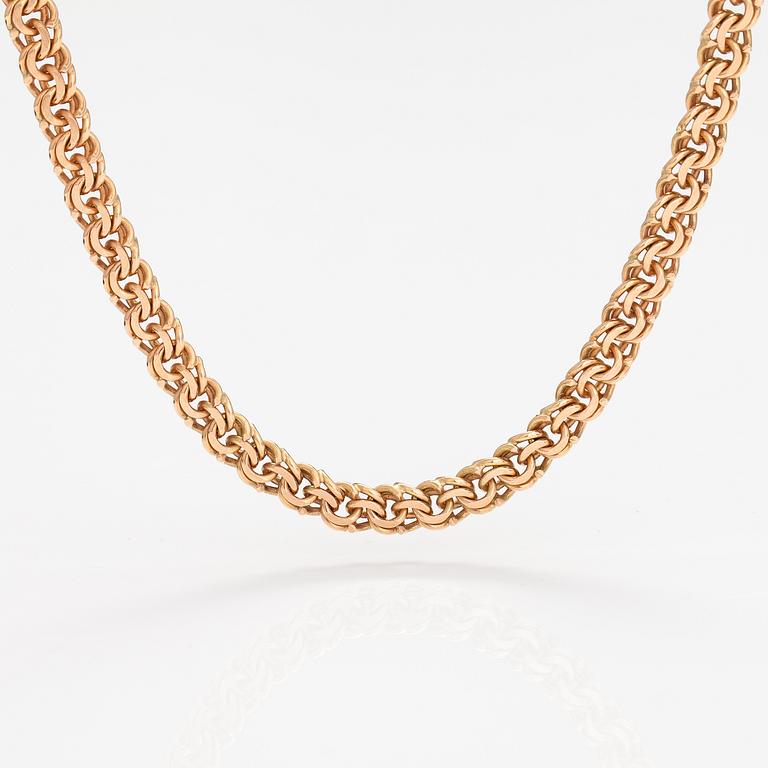 A 14K gold necklace. Russian hallmarks.