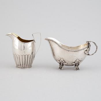 Two creamers, silver, one german and one Johan Petter Grönvall, Stockholm 1827.
