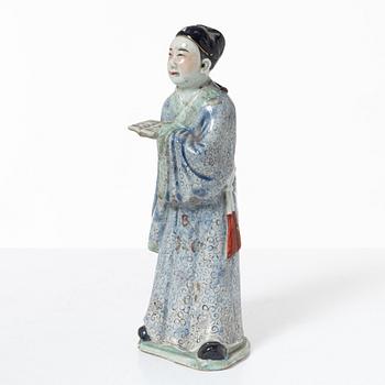A porcelain figurine, China, late Qing dynasty.