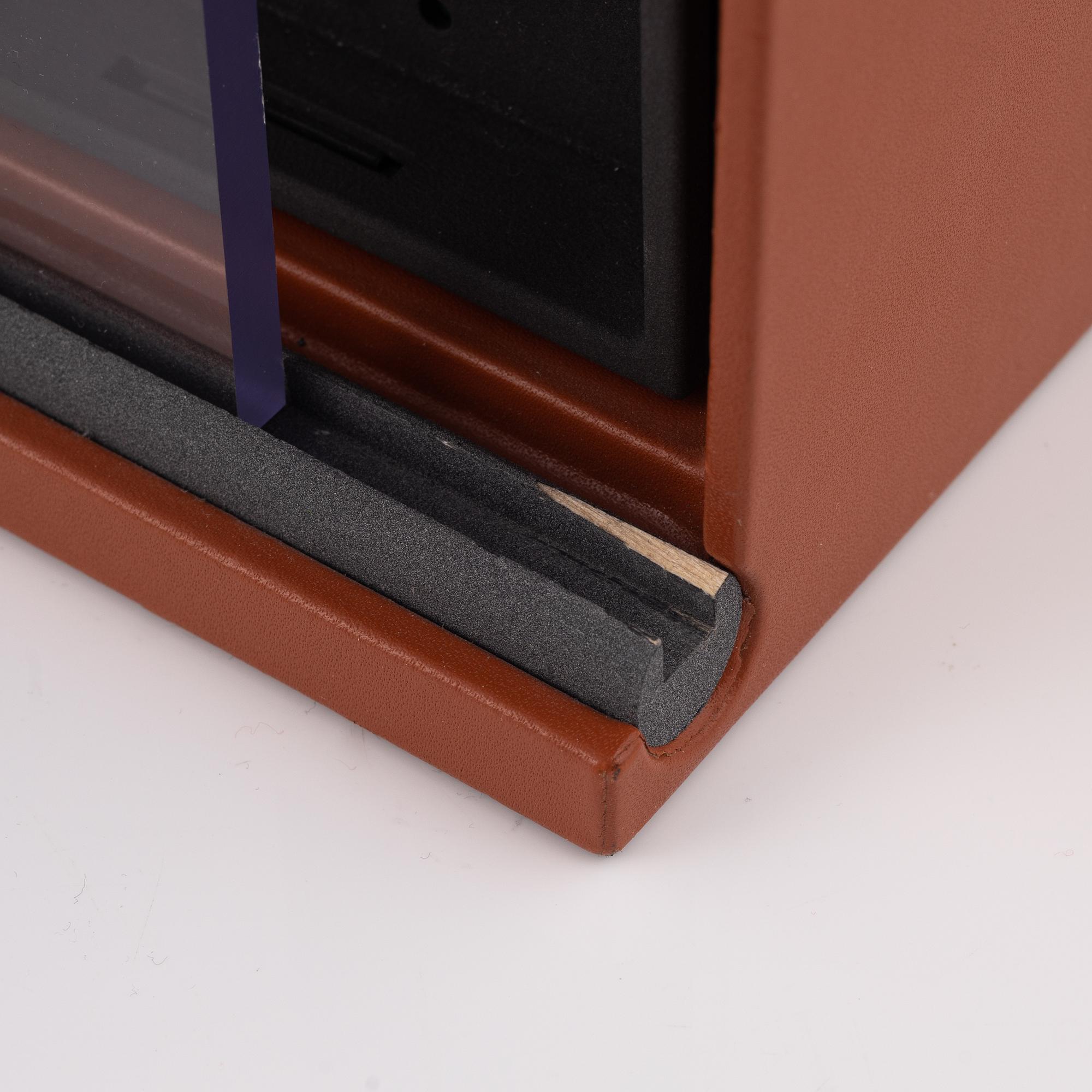 Two watch winders, Underwood, London.