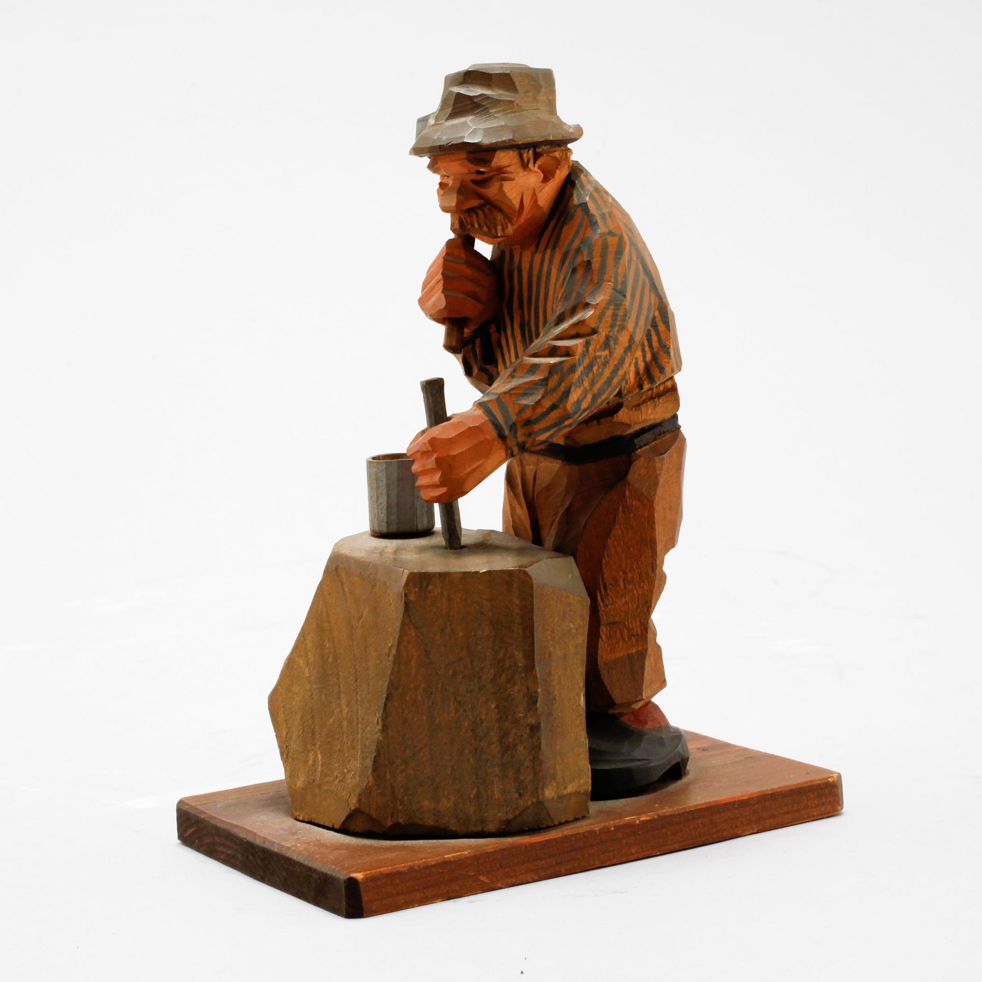 A signed wooden sculpture by CARL OLOF TRYGG.