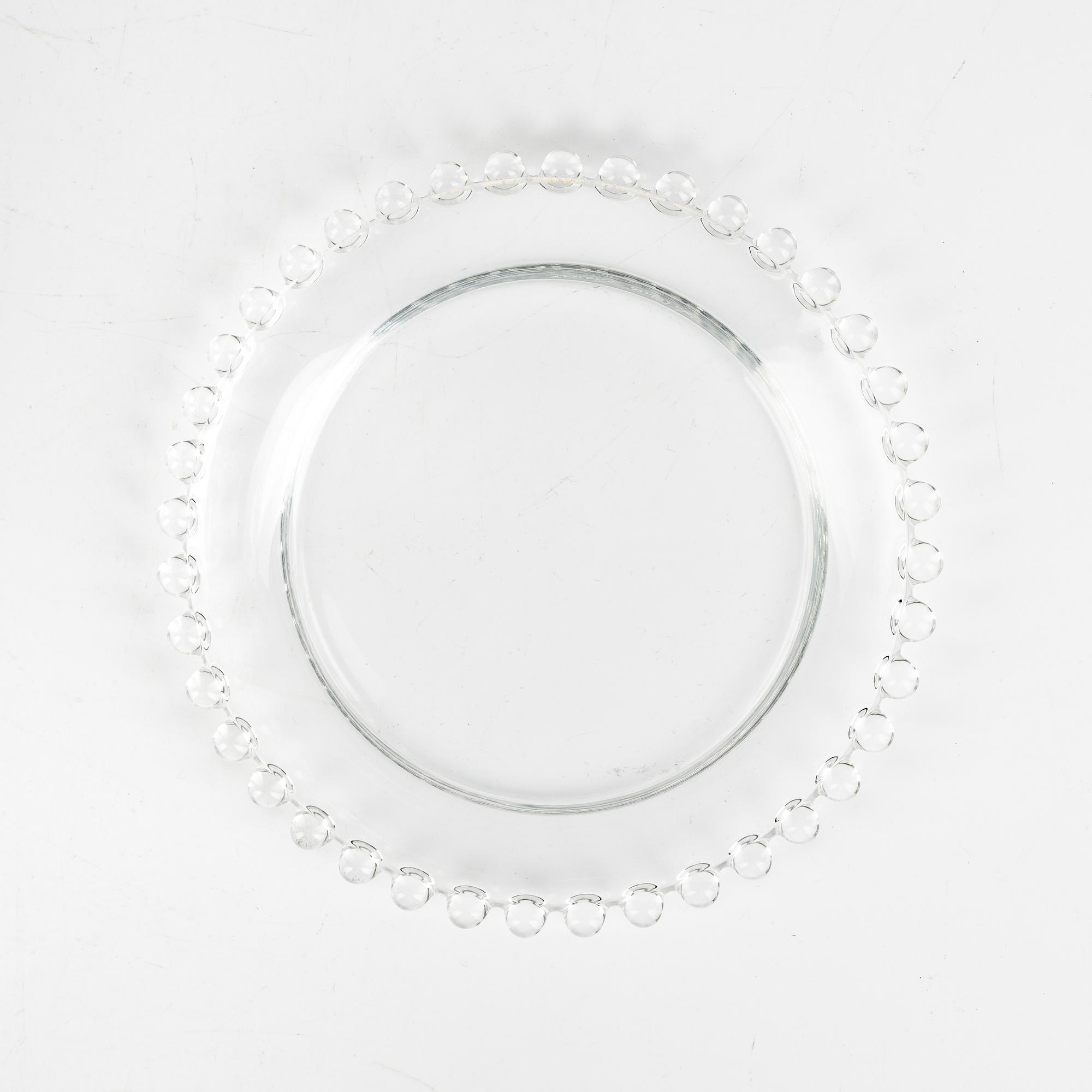 René Lalique, twelve signed glass dishes, 'Andlau', the model designed in 1933.