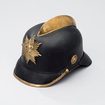 An early 20th century fireman helmet.