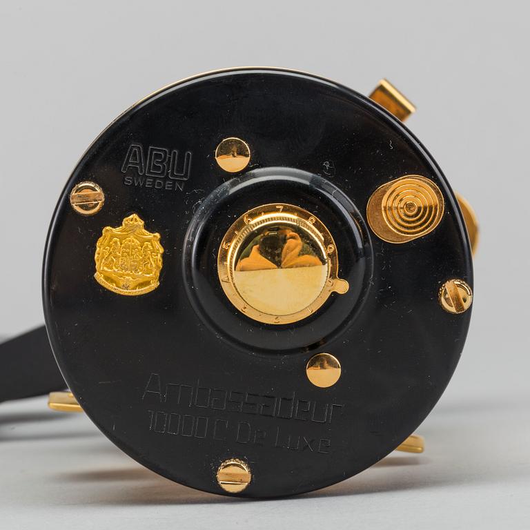 A guilded Ambassadeur 10000C De Luxe REEL BY ABU, SWEDEN. 1990.