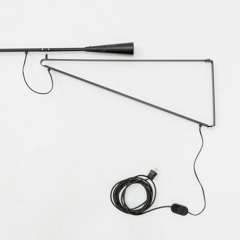 Paolo Rizzatto, a model 265 wall lamp, Flos, Italy.