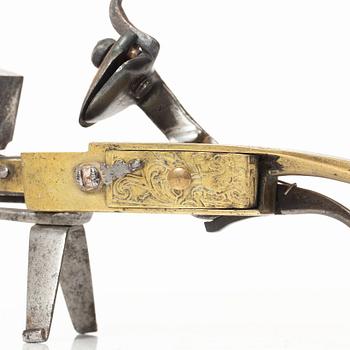 A Northern European flintlock lighter, mid 18th century.