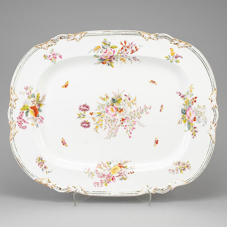 A large enamelled porcelain serving dish, late Empire, second half of the 19th century.