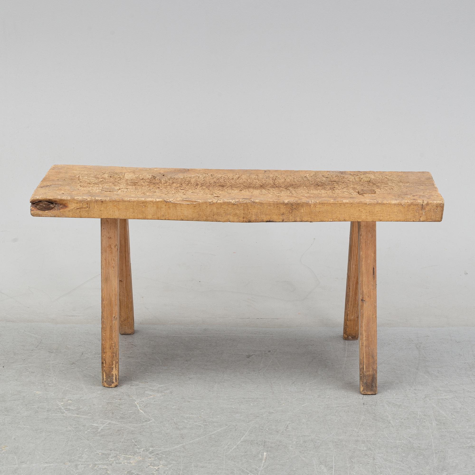 A pine bench, 19th Century.