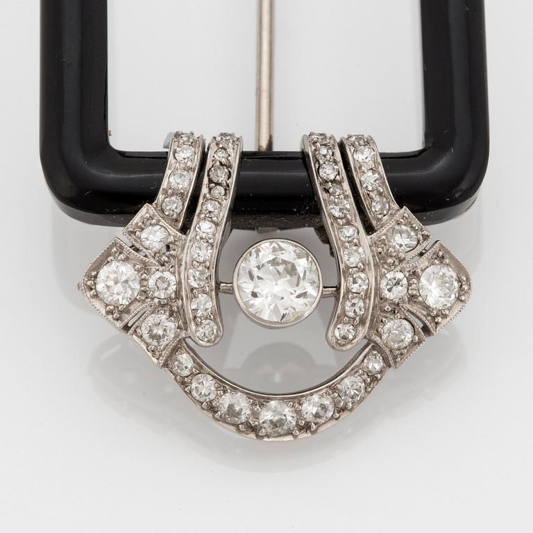 Janesich Art Deco brosch med onyx och gammal- och åttakantslipade diamanter.