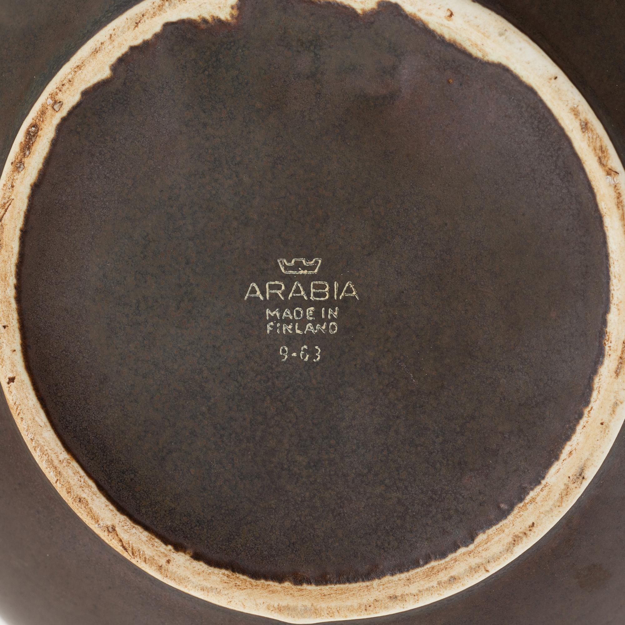Gunnar Nylund, a stoneware teapot from Rörstrand and two teapots and a vase, Arabia.