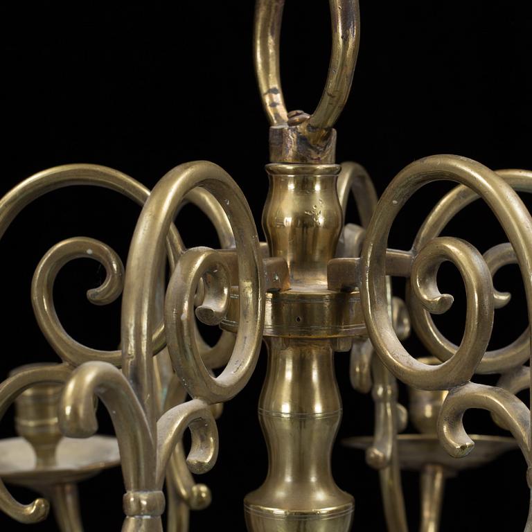 A 18th century brass ceiling light.