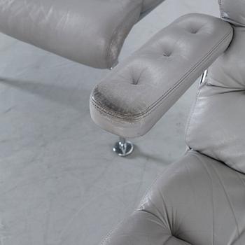 A COUPLE OF BRUNO MATHSSON ARMCHAIRS.