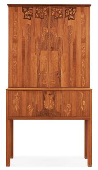 467. Carl Malmsten, A Carl Malmsten walnut and mahogany cabinet with floral inlays, Sweden 1959.